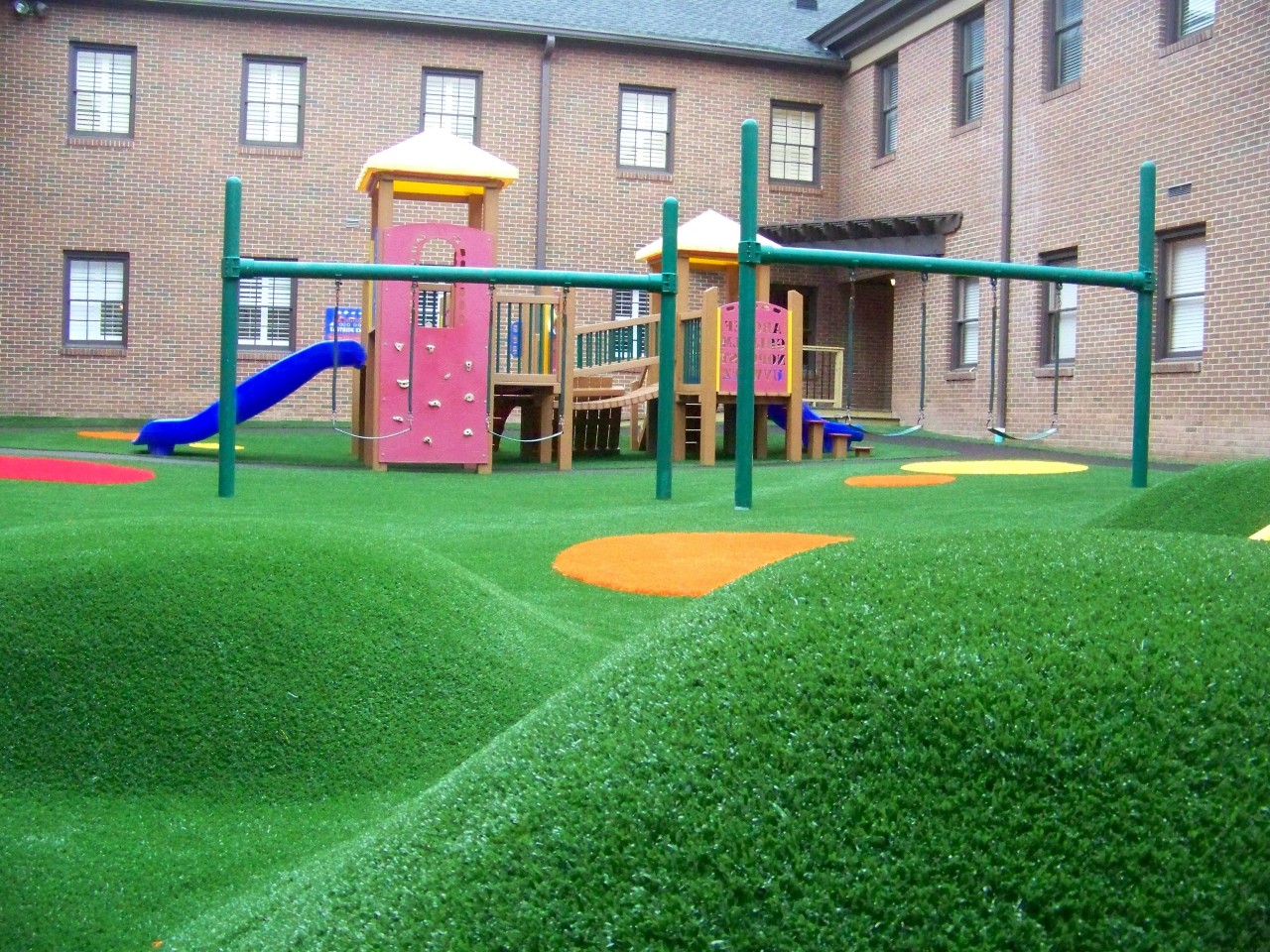Hilly artificial turf playground by Southwest Greens Northern CA West